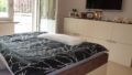 Schlafzimmer im OG mit Balkon