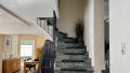Eingangsbereich und Treppe zum OG (Wohnung I)