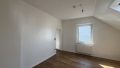 Wohnzimmer mit Zugang zur Küche