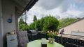 Überdachter Balkon