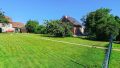 Zusätzliche Rasenfläche / Grundstück hinter dem Haus