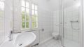 Wohnung 1: Tageslichtbad mit Dusche