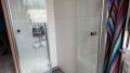 ...mit bodentiefer Dusche