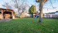 Garten Vorderhaus KI generiert