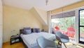 Schlafzimmer zum Balkon