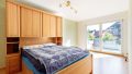 Schlafzimmer mit Balkonzugang