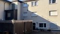 Doppelgarage hinter dem Haus